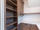 Pantry featuring wooden cabinets, shelves, and countertops at 2101 3Rd N Ave, St Petersburg, FL 33713