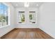 Room featuring hardwood floors and large windows at 2101 3Rd N Ave, St Petersburg, FL 33713