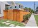 Side view shows wooden fence that adds privacy to the property at 2101 3Rd N Ave, St Petersburg, FL 33713