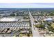 Expansive aerial view of a mobile home community with commercial buildings and neighborhood streets at 2131 Ridge S Rd # 3, Largo, FL 33778
