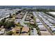 Aerial view of a residential community with mature trees, houses and manicured lawns at 2131 Ridge S Rd # 3, Largo, FL 33778