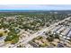 Scenic aerial view overlooking a community featuring lush trees and neighborhood streets at 2131 Ridge S Rd # 3, Largo, FL 33778