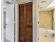 Bathroom featuring tiled walls and floors, a bathtub with a shower, and a toilet at 2131 Ridge S Rd # 3, Largo, FL 33778