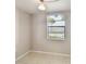 Bedroom with tile floors and a window view at 2131 Ridge S Rd # 3, Largo, FL 33778