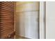 Bright, empty closet with shelving and wood paneled folding door at 2131 Ridge S Rd # 3, Largo, FL 33778