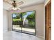 Bright living room with sliding glass doors to the backyard and closet at 2131 Ridge S Rd # 3, Largo, FL 33778
