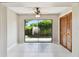 Bright living room with sliding glass doors to the backyard and closet at 2131 Ridge S Rd # 3, Largo, FL 33778
