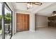 Bright living room with sliding glass doors to the backyard and closet at 2131 Ridge S Rd # 3, Largo, FL 33778