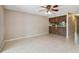 Spacious living room with tile flooring, neutral walls, and lots of natural light at 2131 Ridge S Rd # 3, Largo, FL 33778