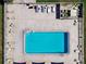 Aerial view of a community pool surrounded by lounge chairs on a sunny day at 2131 Ridge S Rd # 3, Largo, FL 33778