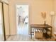 Cozy area with desk with drawers and a view into the bedroom and kitchen beyond at 2137 W Saint Louis St, Tampa, FL 33607