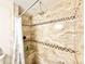 Shower stall with tiled walls, a built-in niche, and decorative accents for a luxurious bathing experience at 2137 W Saint Louis St, Tampa, FL 33607