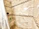Shower with tiled walls, a built-in niche, and decorative accents that provides a luxurious experience at 2137 W Saint Louis St, Tampa, FL 33607