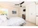 Cozy bedroom featuring a built-in wardrobe and desk area at 2335 Beneva Ter # 2254, Sarasota, FL 34232
