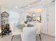 Dining area featuring a round table, four chairs and a built-in bar area at 2335 Beneva Ter # 2254, Sarasota, FL 34232