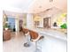 Bright, updated kitchen with white cabinets, granite counters, and stainless steel appliances at 2335 Beneva Ter # 2254, Sarasota, FL 34232