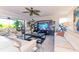 Living room with white furniture and modern decor with sliders to the outside at 2335 Beneva Ter # 2254, Sarasota, FL 34232