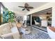Cozy sun room with neutral decor, comfortable seating, and access to the living room at 2335 Beneva Ter # 2254, Sarasota, FL 34232