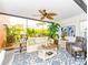 Bright sun room featuring comfortable seating, area rug and outdoor views at 2335 Beneva Ter # 2254, Sarasota, FL 34232
