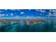 Beautiful panoramic aerial view shows community with bay and canals and easy beach access at 240 Sand Key Estates Dr # 222, Clearwater, FL 33767