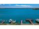 Panoramic view of the bay and canal from the upper floors overlooking private boat docks at 240 Sand Key Estates Dr # 222, Clearwater, FL 33767