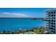 Water view from condo overlooking canal and bay with private boat docks and tennis courts at 240 Sand Key Estates Dr # 222, Clearwater, FL 33767