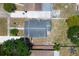 Overhead shot of a home with a dark gray roof and minimal landscaping sitting in a residential neighborhood at 2627 17Th N Ave, St Petersburg, FL 33713