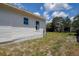 The backyard has healthy grass, a partial fence, and a storage shed at 2627 17Th N Ave, St Petersburg, FL 33713