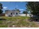 An outdoor area features a partial privacy fence and a well-maintained lawn at 2627 17Th N Ave, St Petersburg, FL 33713