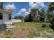 Property has a big backyard, partially surrounded by a privacy fence and mature shade trees at 2627 17Th N Ave, St Petersburg, FL 33713