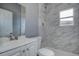 Updated bathroom featuring decorative tile and modern fixtures at 2627 17Th N Ave, St Petersburg, FL 33713