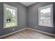 Cozy bedroom offering bright windows and gray painted walls at 2627 17Th N Ave, St Petersburg, FL 33713