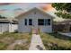 Charming white home featuring a minimalist design and cozy front entrance at 2627 17Th N Ave, St Petersburg, FL 33713
