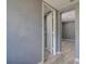Bright hallway featuring neutral paint, trim and stylish wood-look flooring at 2627 17Th N Ave, St Petersburg, FL 33713