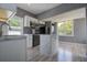 Modern kitchen with marble island, sleek cabinets, and contemporary appliances at 2627 17Th N Ave, St Petersburg, FL 33713