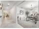 Stylish dining room with modern chandelier and decorative accents at 30572 Thunderbird Dr, Wesley Chapel, FL 33545