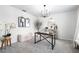 Elegant dining room with stylish decor, modern lighting, and chic accents at 30572 Thunderbird Dr, Wesley Chapel, FL 33545