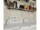 This laundry room features side by side washing machine and dryer with overhead storage at 3229 40Th S Ln # C, St Petersburg, FL 33711