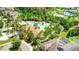 Aerial shot of the beautiful community pool, surrounded by lush landscaping and offering resort-style amenities at 32825 Sand Creek Dr, Wesley Chapel, FL 33543