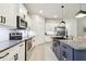 Well-appointed kitchen featuring stone countertops, stainless steel appliances, and ample cabinet space at 32825 Sand Creek Dr, Wesley Chapel, FL 33543