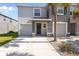 Charming two-story townhome with an attached single garage and well-maintained landscaping at 3334 Pleasant Willow Ct, Brandon, FL 33511