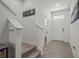 Hallway with stairs, leading to an open doorway at 3334 Pleasant Willow Ct, Brandon, FL 33511