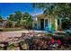 Bright backyard studio with brick patio, perfect for relaxation and surrounded by mature landscaping at 420 Roanoke St, Dunedin, FL 34698