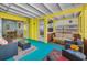Bright Sunroom showing outdoor access to the home's back entrance at 420 Roanoke St, Dunedin, FL 34698