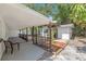 Wide angle view of the backyard featuring an open patio and pergola at 4812 El Capistrano Dr, Tampa, FL 33634