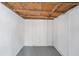 Unfinished basement ready for your creative renovation; ceiling and walls are exposed at 4812 El Capistrano Dr, Tampa, FL 33634