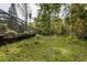 A large, secluded backyard offers peaceful seclusion and privacy at 5619 Essex Ct, Palm Harbor, FL 34685