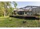 A large, secluded backyard offers peaceful seclusion and privacy at 5619 Essex Ct, Palm Harbor, FL 34685
