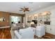 Bright and open living room with custom built-ins and comfortable seating at 5619 Essex Ct, Palm Harbor, FL 34685