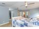 Spacious main bedroom with adjacent en-suite and outdoor access at 5619 Essex Ct, Palm Harbor, FL 34685